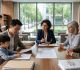Chinese family reunion visa documents and immigration application files on a professional law office desk